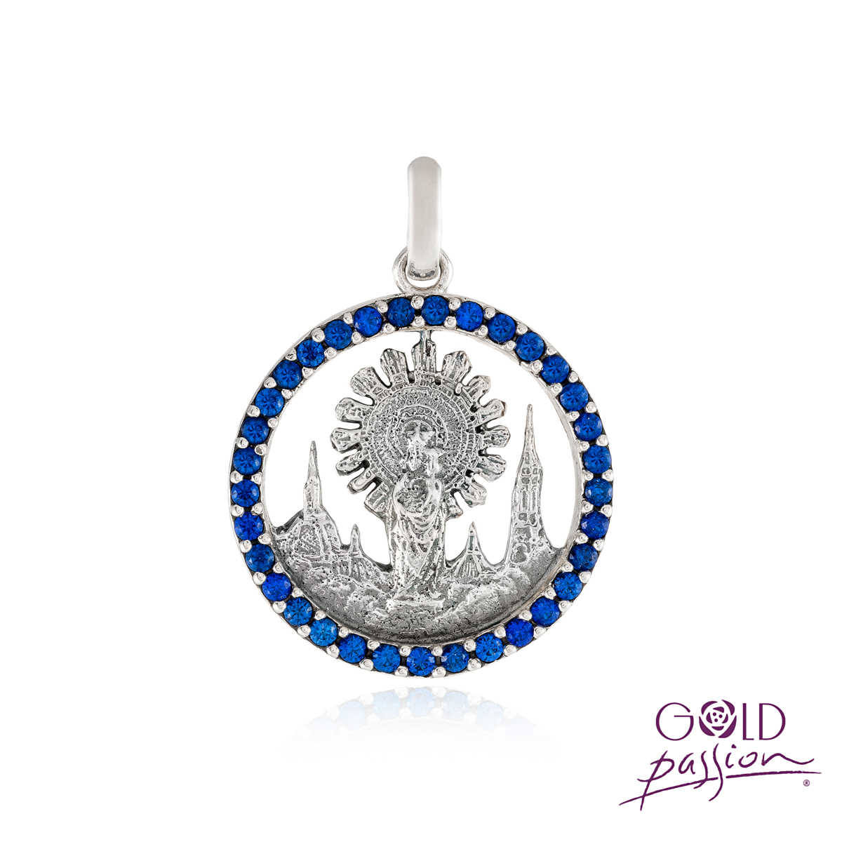 Medalla de Virgen del Pilar calada fabricada en plata oxidada con circonitas azul zafiro Medalla de Virgen del Pilar calada fabricada en plata oxidada con circonitas azul zafiro